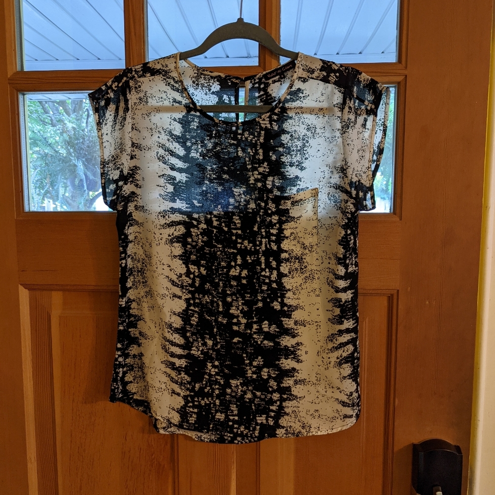Sheer blouse with front pocket design